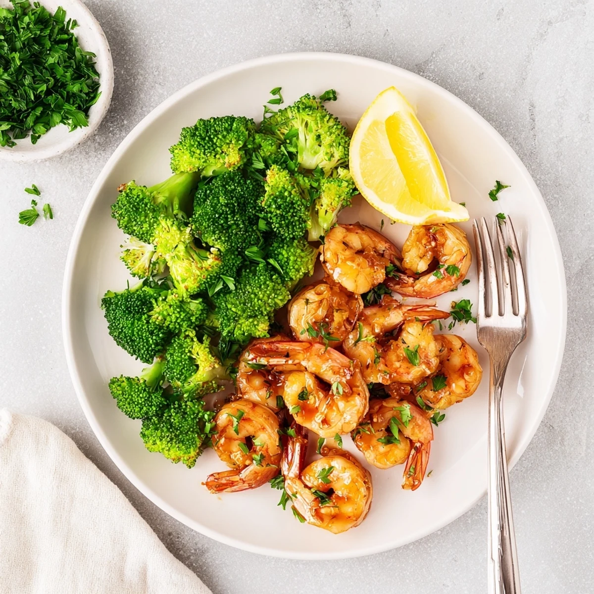 In this Honey Garlic Butter Shrimp & Broccoli dish, juicy pink shrimp and crisp broccoli are tossed in a savory garlic butter sauce.