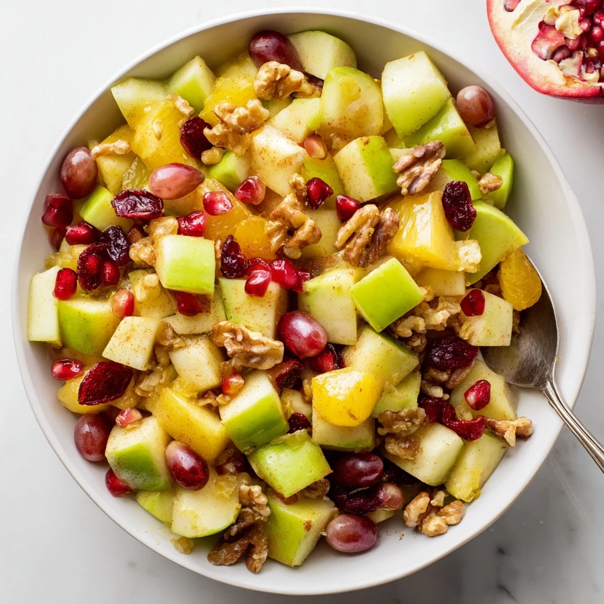 Refreshing Minute Fall Fruit Salad tossed in citrus cinnamon dressing with dried cranberries