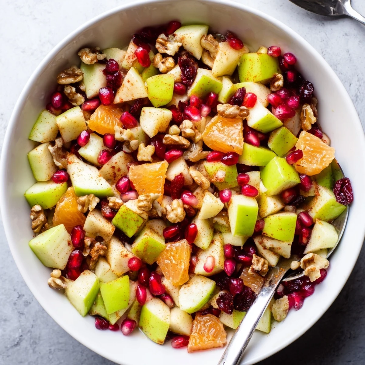 Golden honey-glazed Minute Fall Fruit Salad featuring diced apples and pears with red grapes