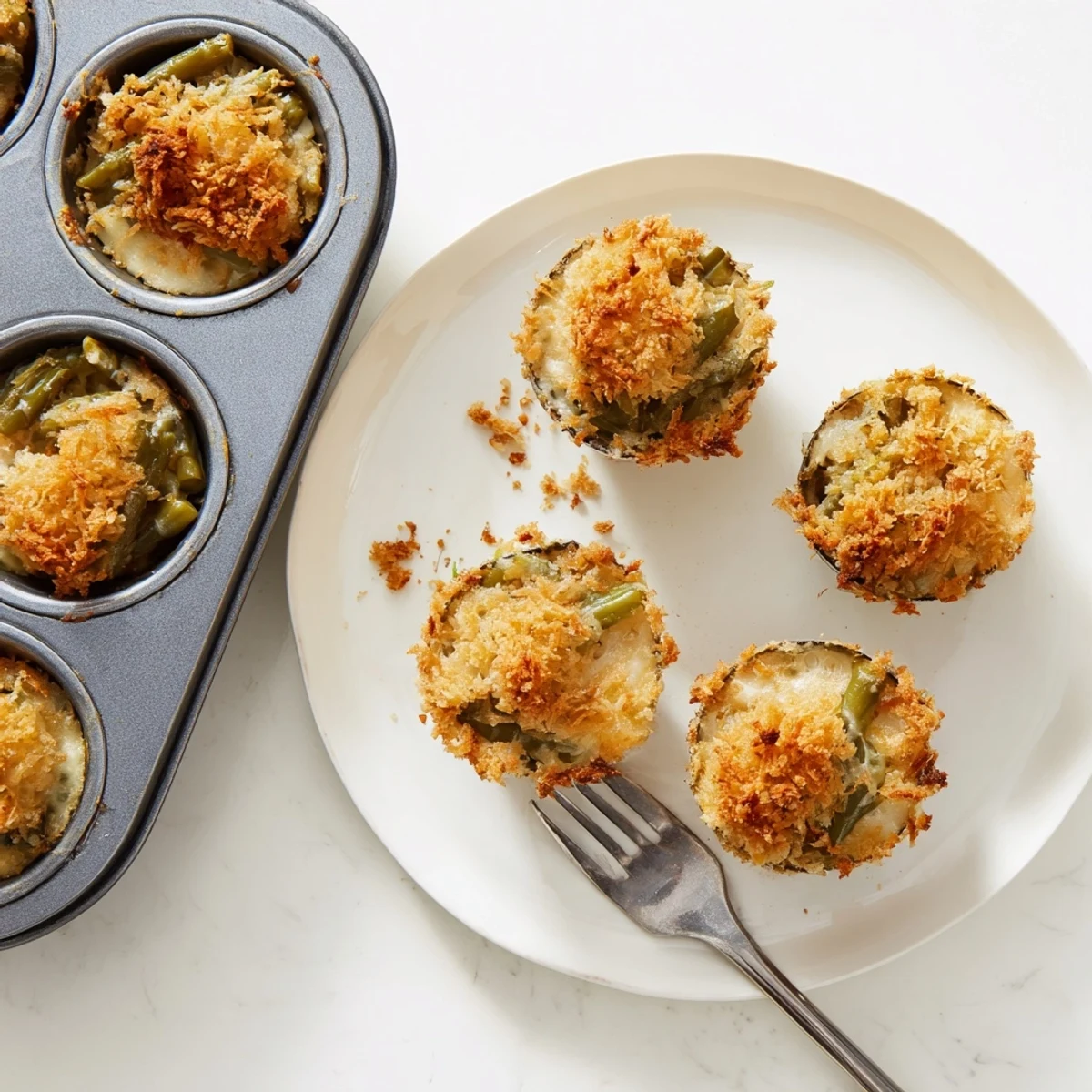Golden brown Garlic Parmesan Green Bean Casserole Cups with crispy panko topping and bubbling cheese