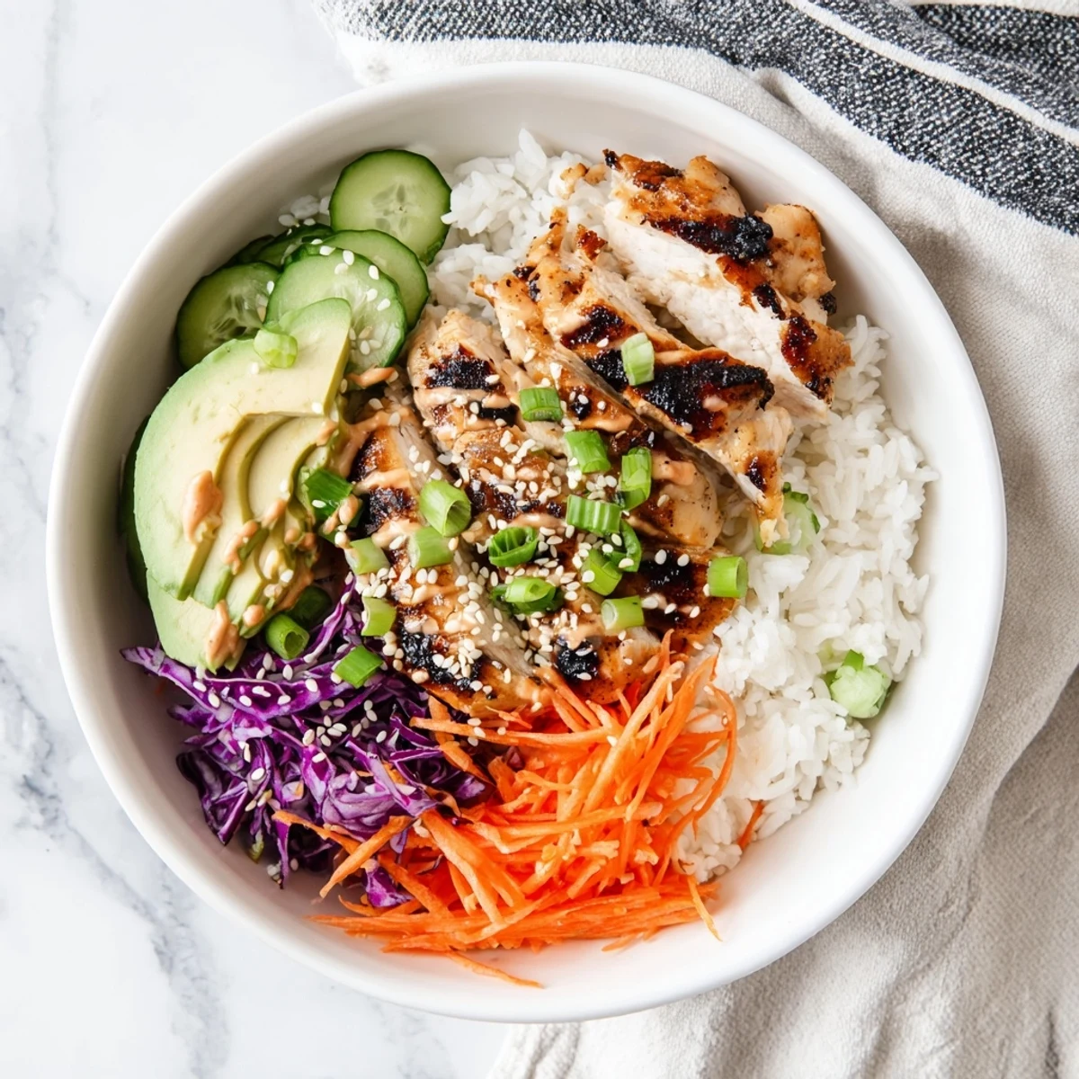 Golden grilled chicken thighs glazed in Korean BBQ sauce atop fluffy white rice with colorful shredded vegetables and spicy gochujang mayo drizzle.