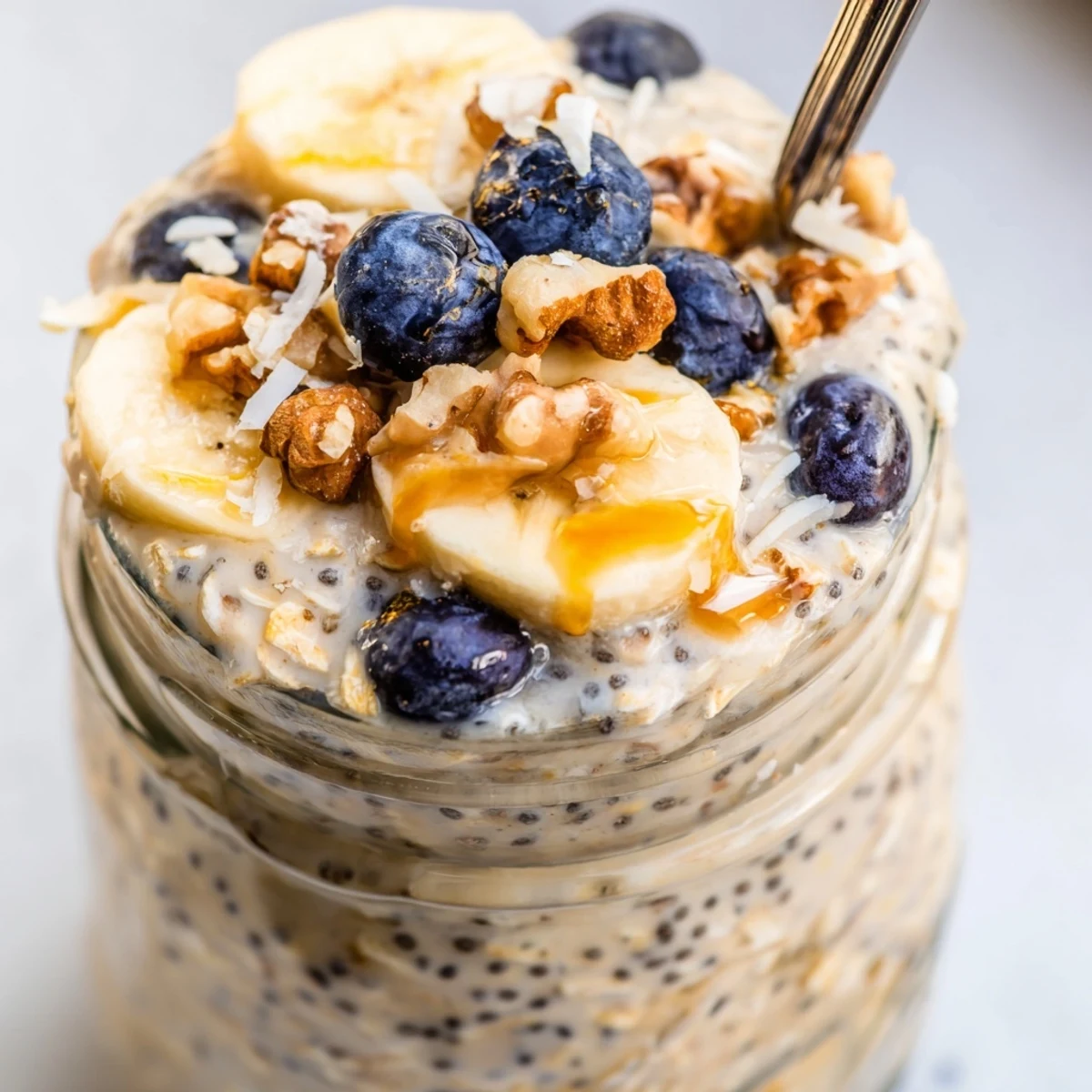 Protein overnight oats served cold with a drizzle of peanut butter